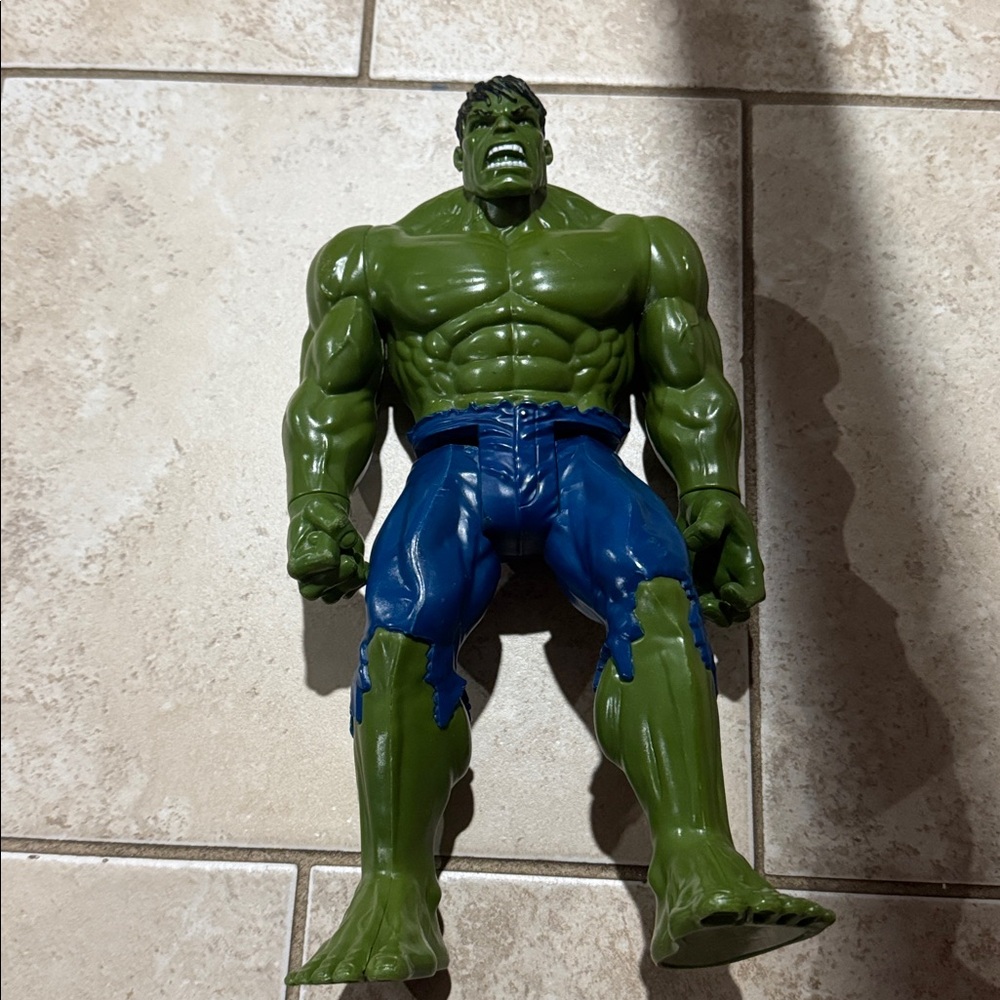 Green and Blue Action Figure